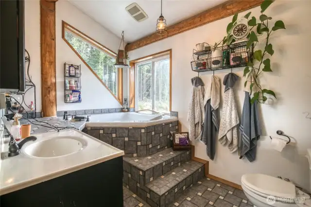 Upper floor attached bathroom, corner tub w/ view