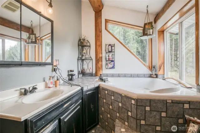Upper floor attached bathroom, corner tub w/ view
