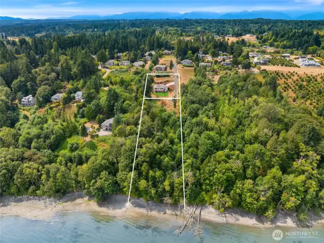 Sale includes adjacent tax parcel, which is a buildable waterfront lot. Vacant lot is 1.55 acres and house lot is 0.76 acres for a total of 2.31 acres.