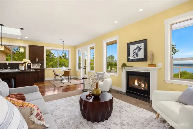 Cozy living room off of kitchen with gas fireplace.