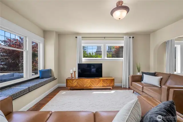 Spacious living area is perfectly situated off the entry of the home.
