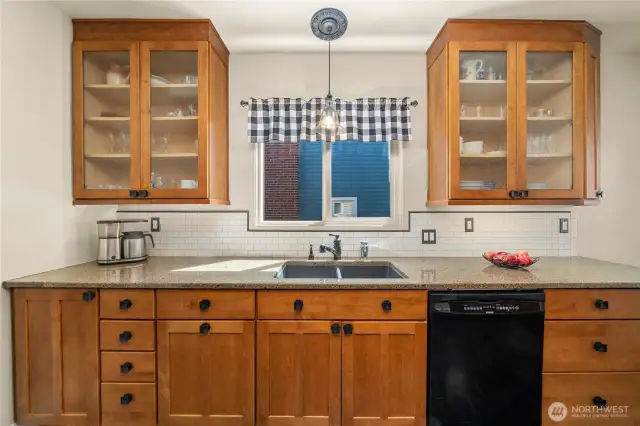 Plenty of counter space, ample cabinetry, and seamless flow—style meets function.