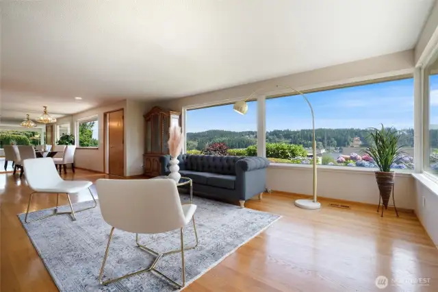Glimpses of Gig Harbor Bay are also viewed from this home, along with glorious sunrises against the backdrop of Mt. Rainier.