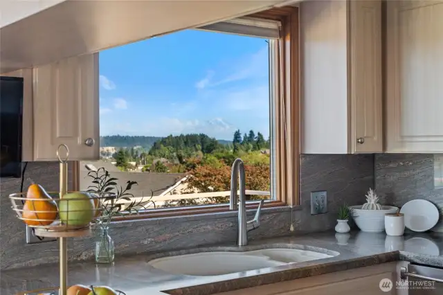 Enjoy majestic Mt. Rainier views while washing dishes or preparing a meal.