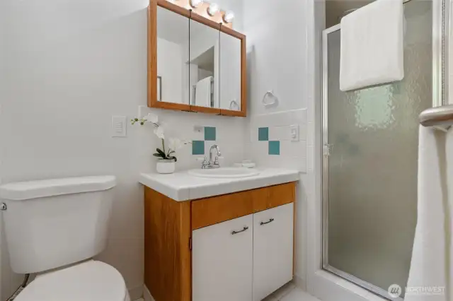 A 3/4 bath is included in the primary bedroom with tile flooring and countertop.