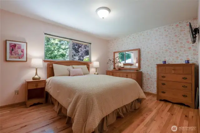 A third bedroom is a nice size and enjoys the same beautiful hardwood flooring this home exudes.