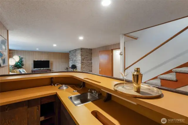 The bar includes a sink and a secret hiding spot.