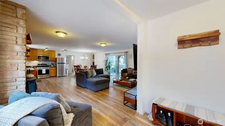 Step into this open-concept living with seamless flow from kitchen to dining and lounge.