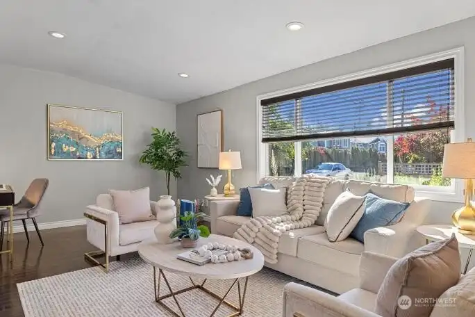 Warm light streams in from newly updated windows throughout