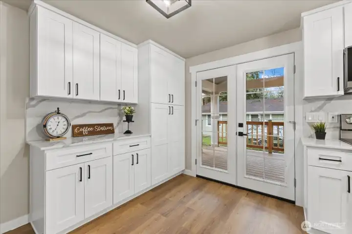 All these cabinets extend into the comfortable dining area
