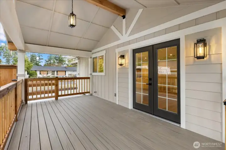 Side deck with french doors leading into great room