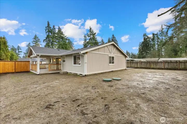 fully fenced, leveled back yard