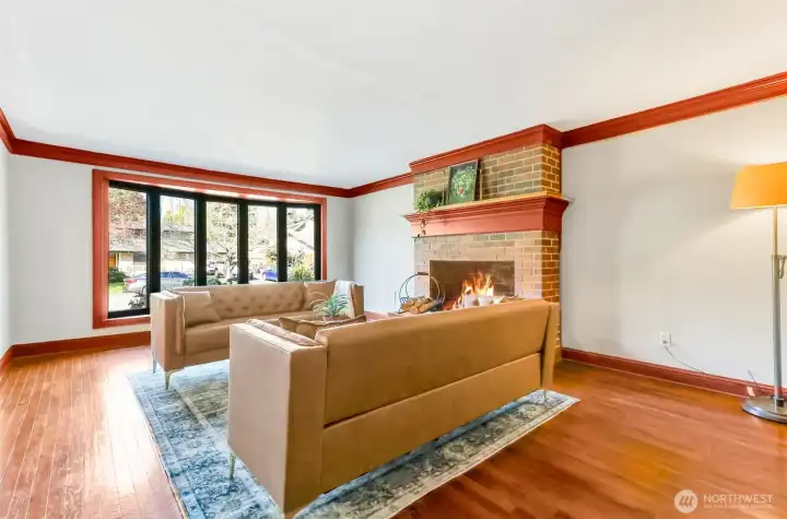 Formal LR has a brick fireplace.