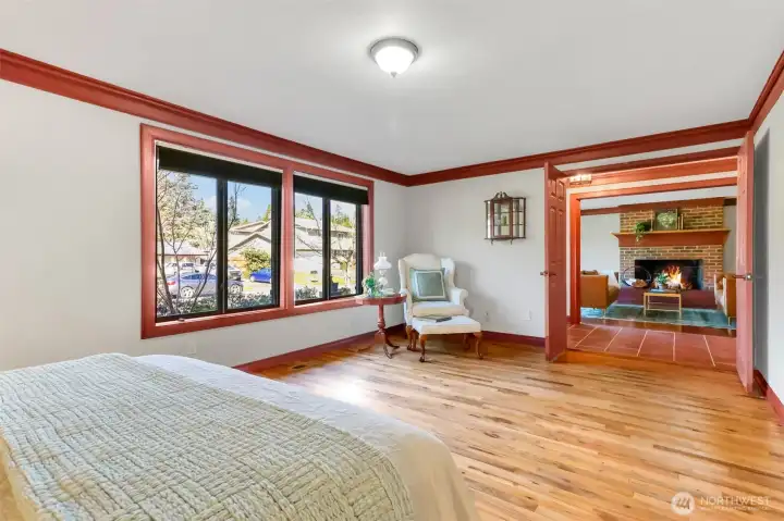 Primary is across from LR and has hardwood floors.