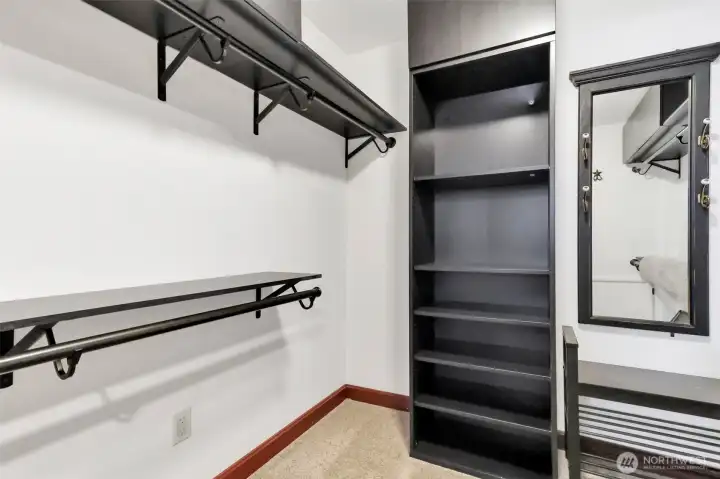 Large custom walk in closet.