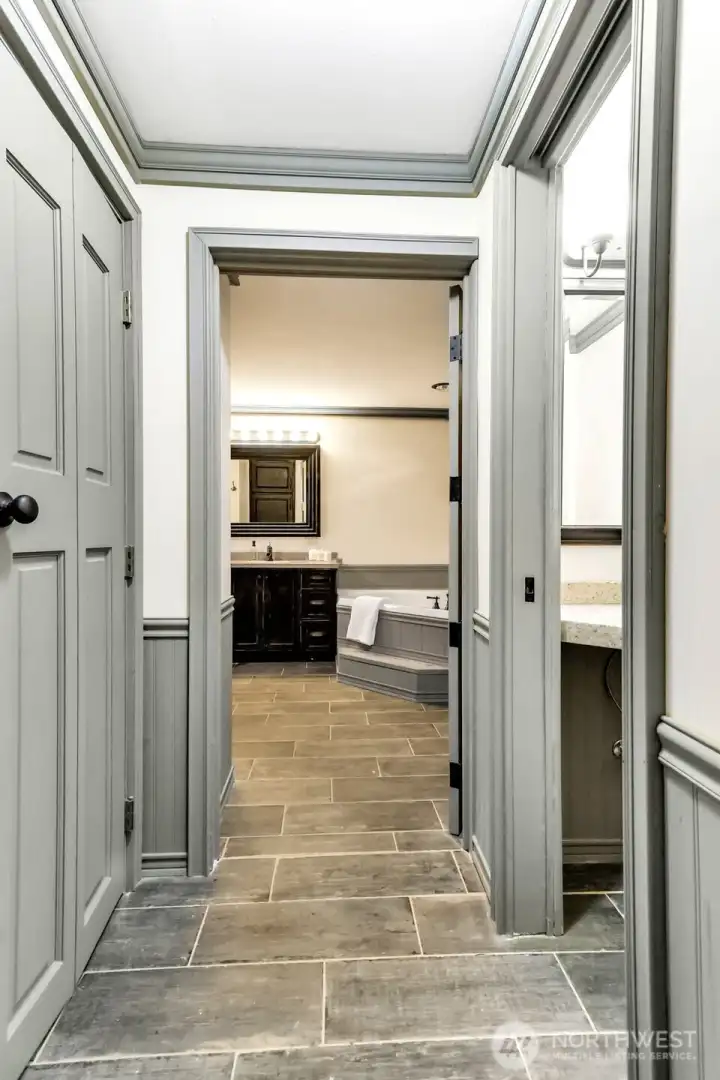 Guest bath services 2nd and 3rd BRs and has a second toilet/ powder room.