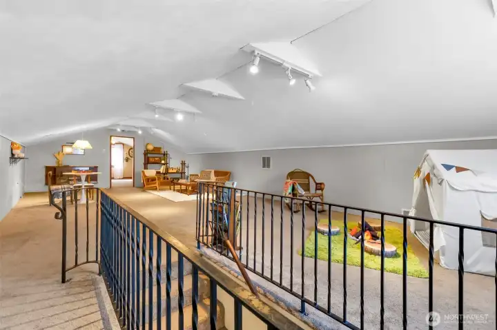 1000 sq foot upstairs bonus room could be used for multi purposes, whatever you wish.