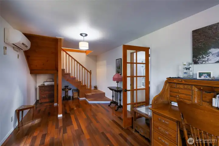 Entrance with door leading into Utility Room, Full bathroom and storage room.
