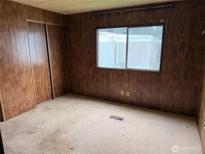 Primary bedroom bath at back of home
