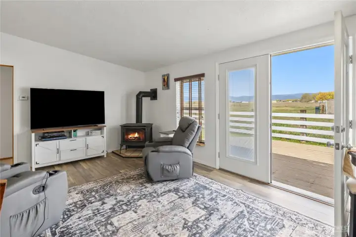 From the great room, access the back deck where you can relax and enjoy a morning sunrise and cup of coffee!