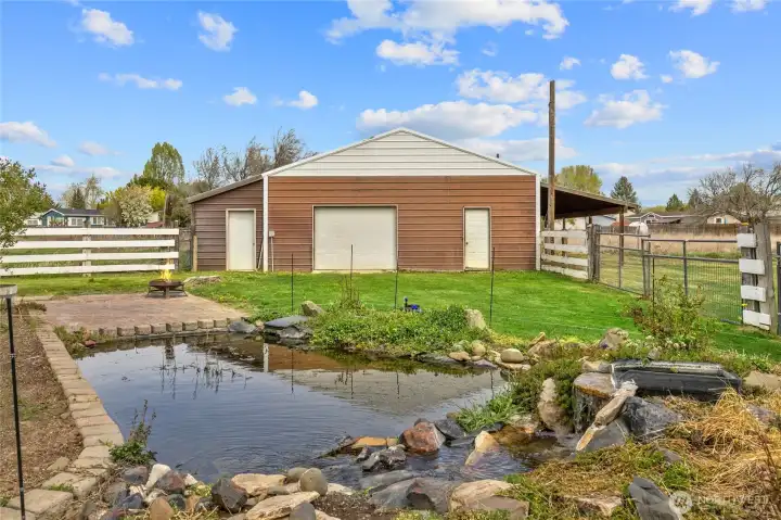 Water feature with waterfall, patio and barn!