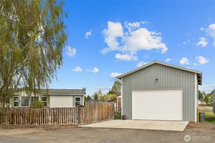24 X 36 shop that has a separate workshop area and loft storage!  There is even a lift to get items to the loft!
