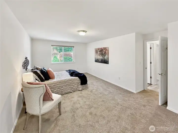 Another view of the primary bedroom...lots of wall space too!