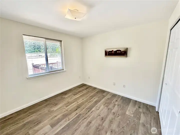 3rd bedroom with newer laminate flooring.