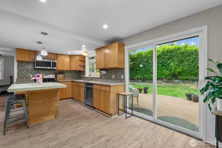 Kitchen sink window provides views to private back yard