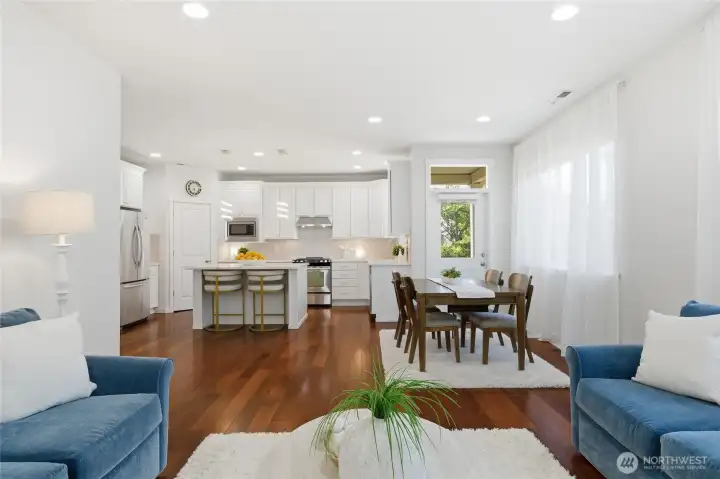 Open concept great room, dining area, and kitchen keeps everyone gathered together.