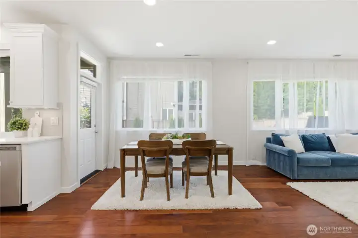 Dining area with entrance to expanded patio.