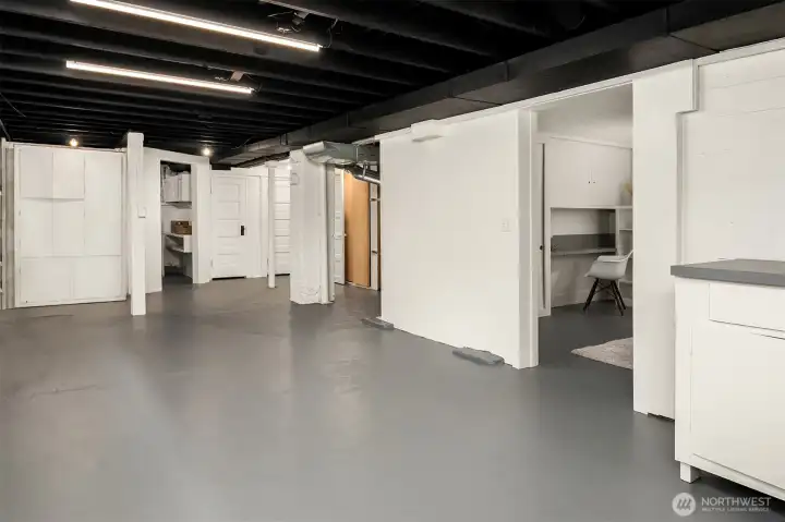 Freshly painted basement with great ceiling height.