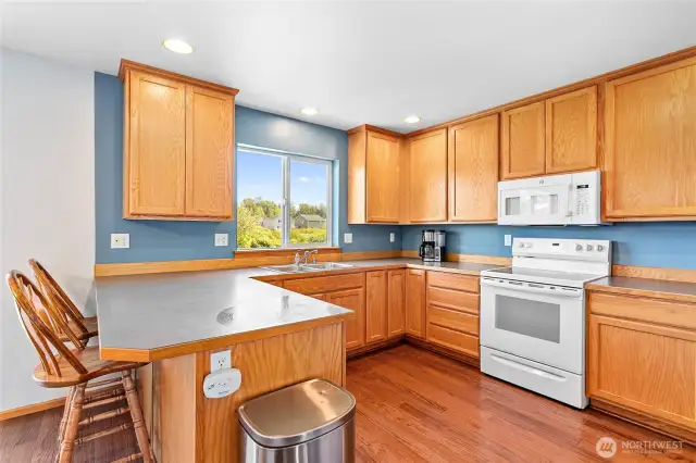 Kitchen offers ample storage space in a very workable floor plan and a new dishwasher.