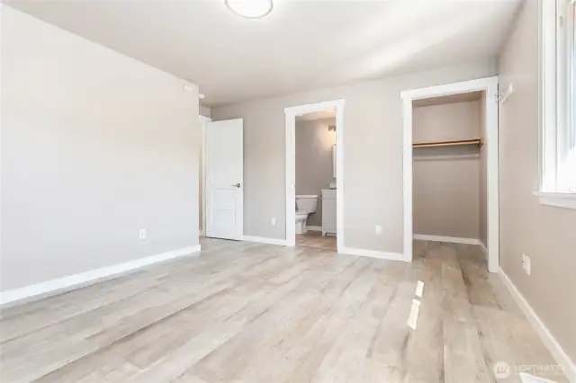 Primary Bedroom with walk-in closet and bath.
