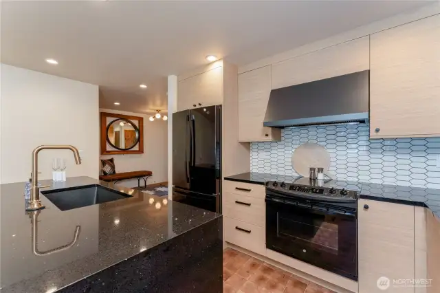 Staged unit B2 shown, similar to F2. Furniture and decor not included.