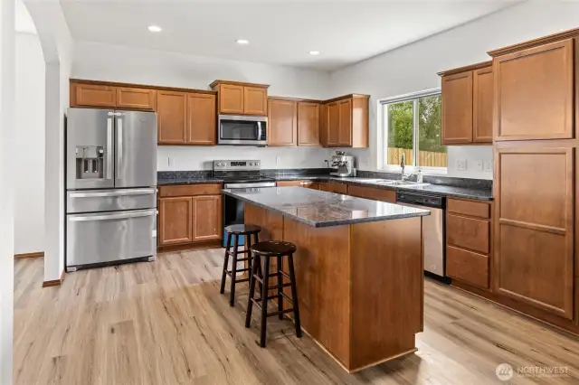 Fridge, NEW range and microwave and dishwasher all stay.