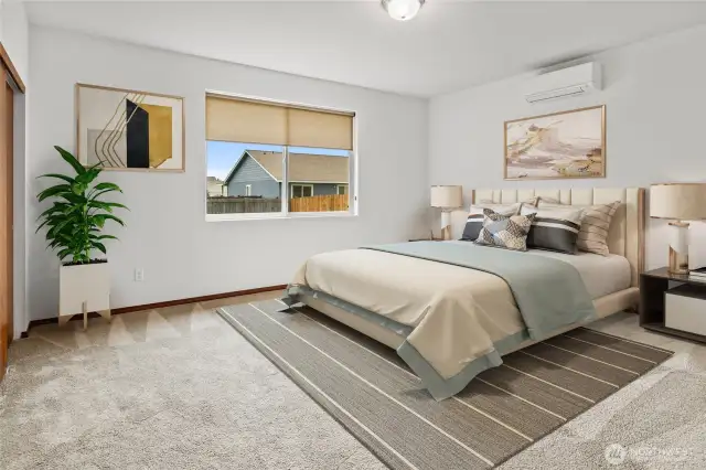 virtually staged primary bedroom.