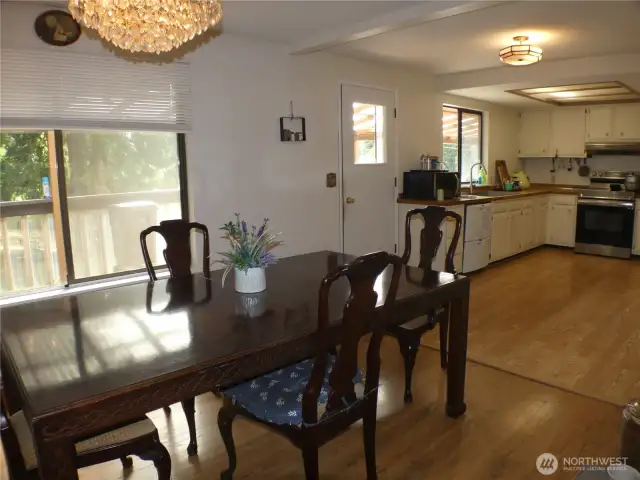 Dining opens to kitchen