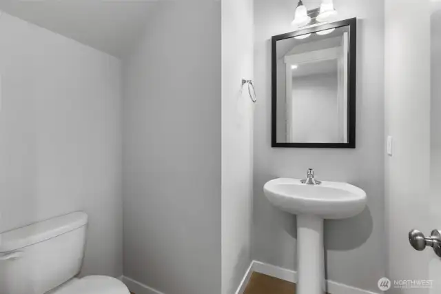 Main floor half bath     Photos of a finished home in same community