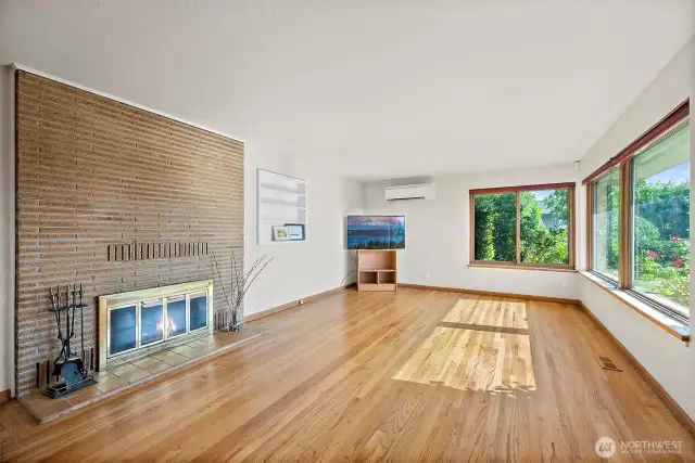 Cozy up in living room next to the wood burning fireplace
