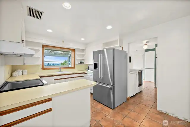 Kitchen flows into utility room