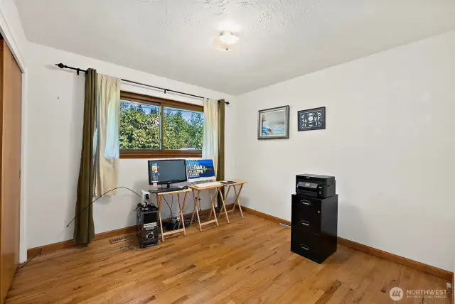 1st bedroom down main hallaway, great for guest room or office space