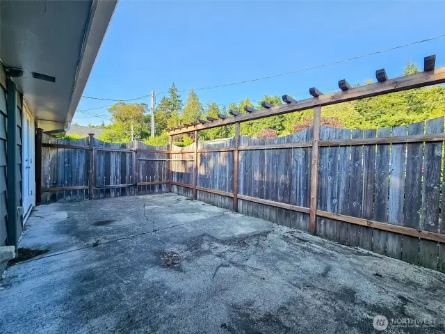 Fenced in patio off primary bedroom