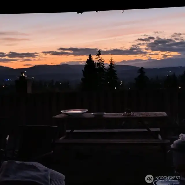 Backyard panoramic view of the olympic mts and foothills. Sunsets here bring peace and tranquility to your evenings on the patio.