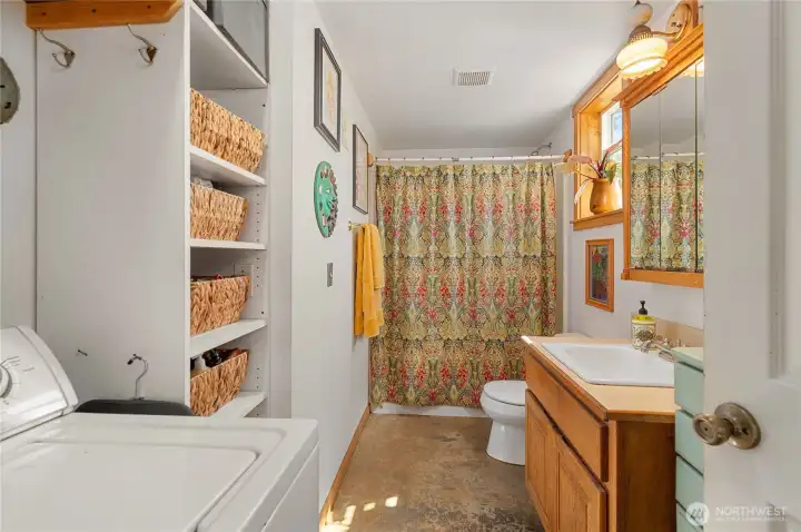 Shop bathroom with a washing machine