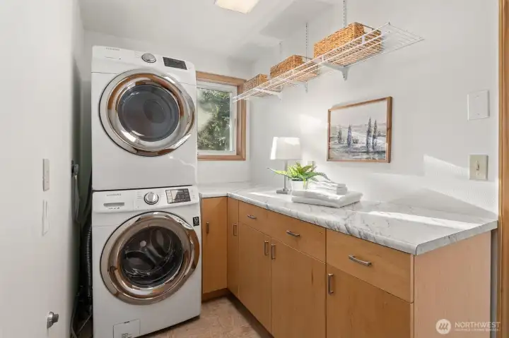 Large utility room with storage/counter space.