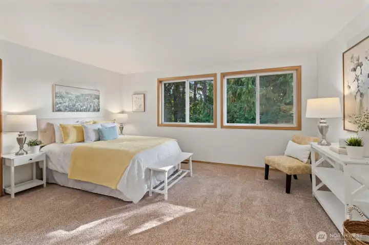 Upstairs the primary suite features a gas fireplace, walk-in closet and full attached bathroom with separate shower, soaking tub, double vanity and toilet closet.