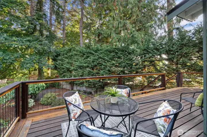 The private, secluded backyard features deck perfect for entertaining and hot tub for relaxing!