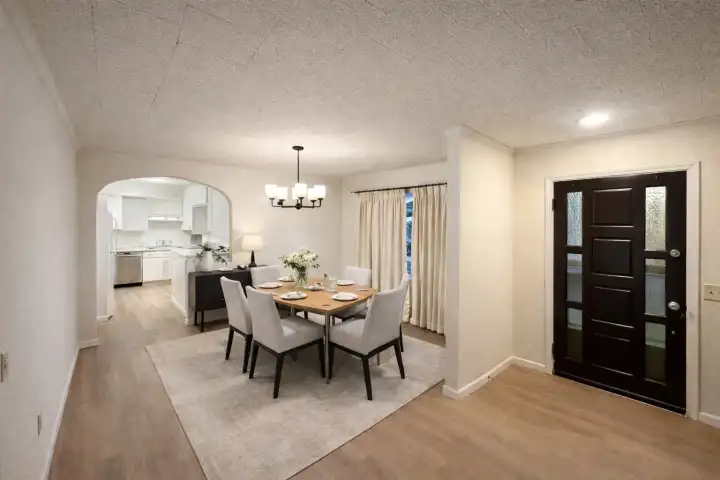 dinning room leading to kitchen room (virtually staged)
