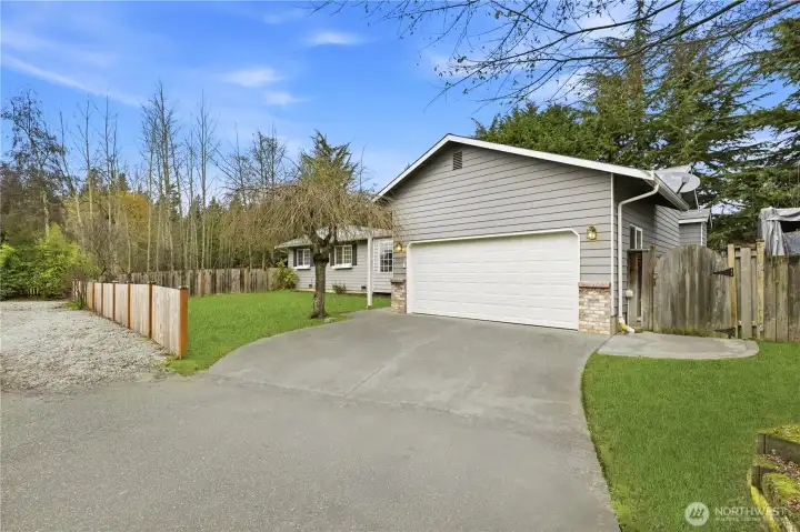 Welcoming single-level home with extra parking and a quiet setting.